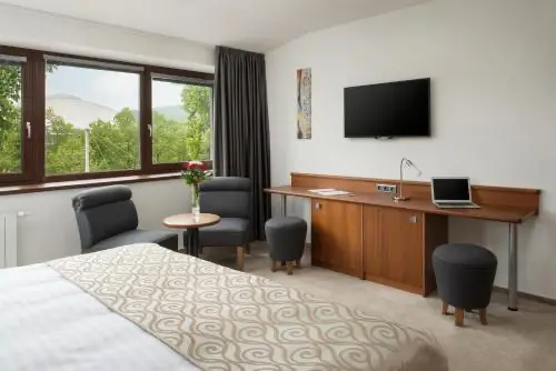 Integrity penzion1 | Venclíkovi.cz Elegantní pokoj v Penzionu Integrity Brno s výhledem do zeleně a klidnou atmosférou